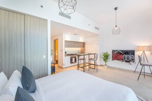 1 bedroom, desk, iron/ironing board, travel crib
