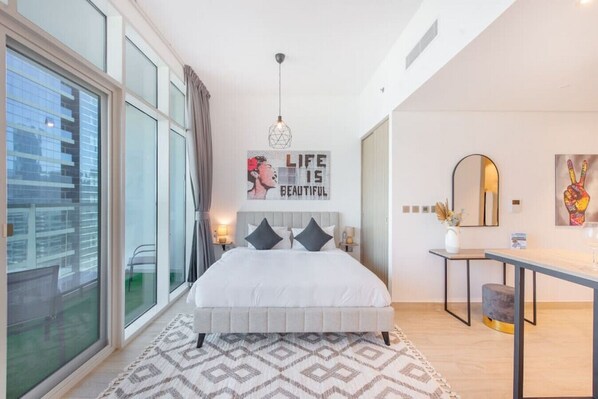 1 bedroom, desk, iron/ironing board, travel crib