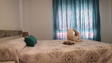 City-Apartment | 1 Schlafzimmer, Daunenbettdecken, Verdunkelungsvorhänge, Reisekinderbett