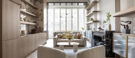 Louvre II | Living area | 100-cm Smart TV with cable channels, fireplace, Netflix