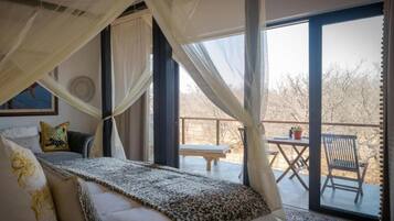 Luxe beddengoed, pillowtop-bedden, een kluis op de kamer