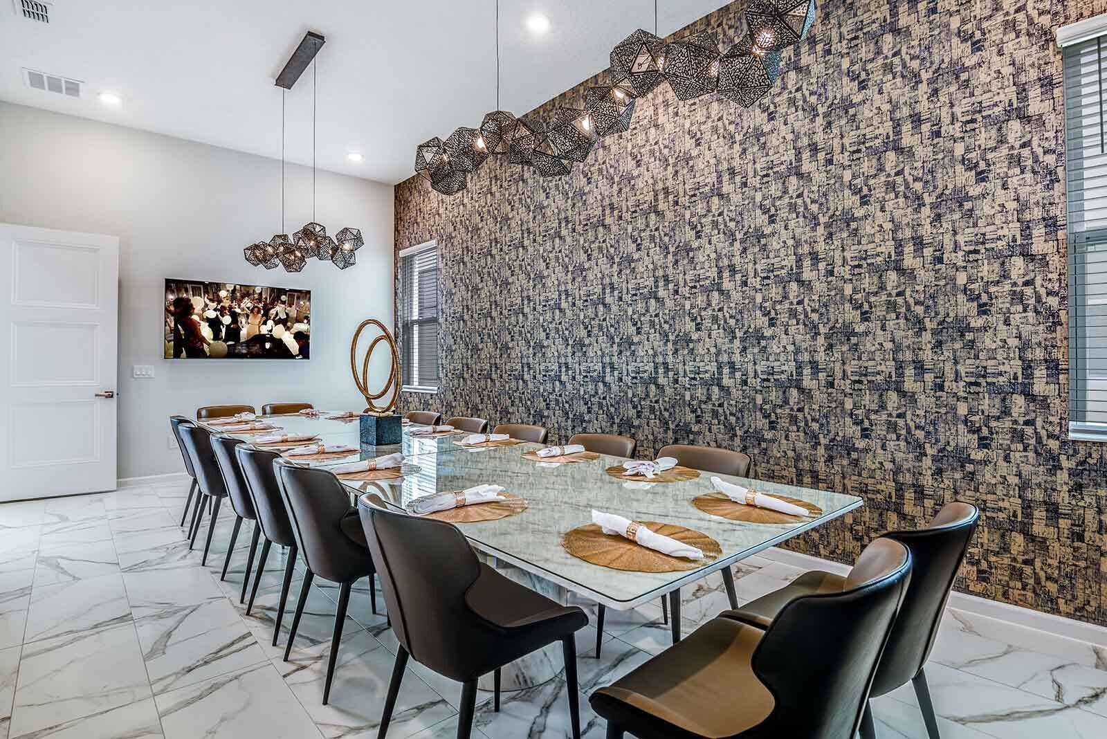 A modern conference room with a glass table, leather chairs, and a textured wall.