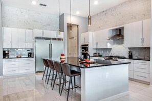 Fridge, microwave, oven, stovetop - Luxe Villa w/ Karaoke RM, Football Theme BR, Arcade, Theater & Gym - Near Disney (Davenport)