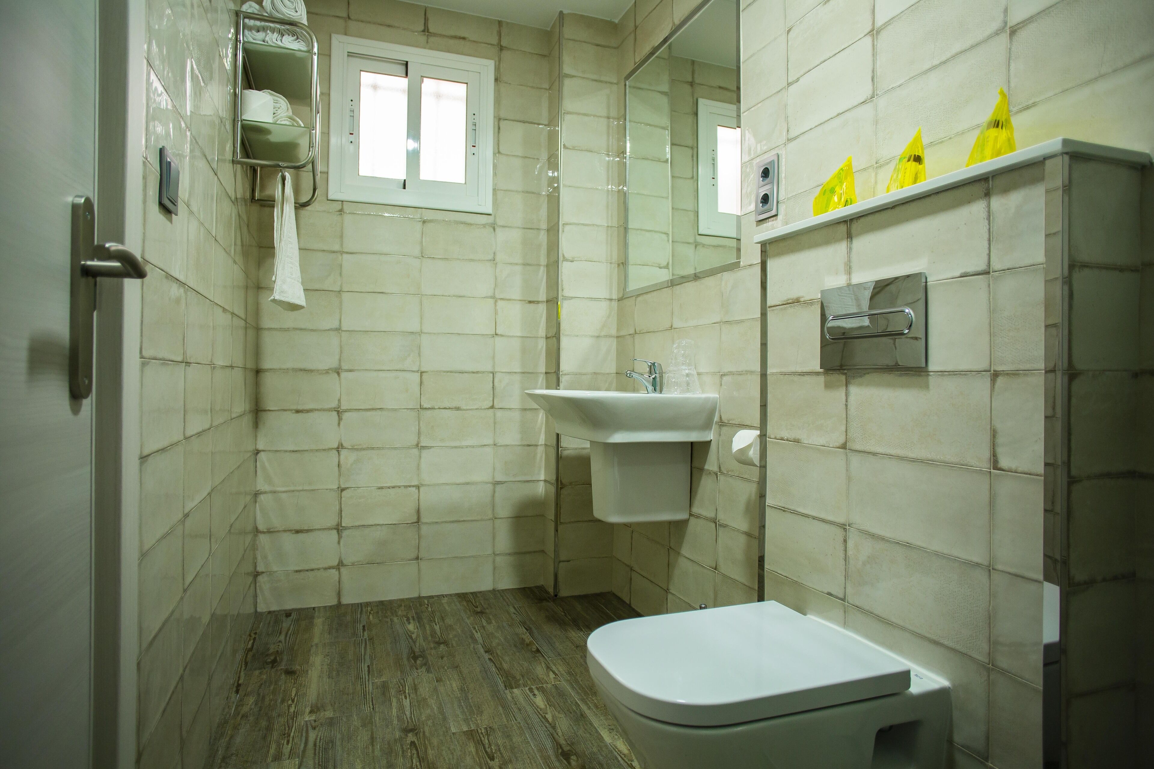 deluxe double room | bathroom | hair dryer, towels