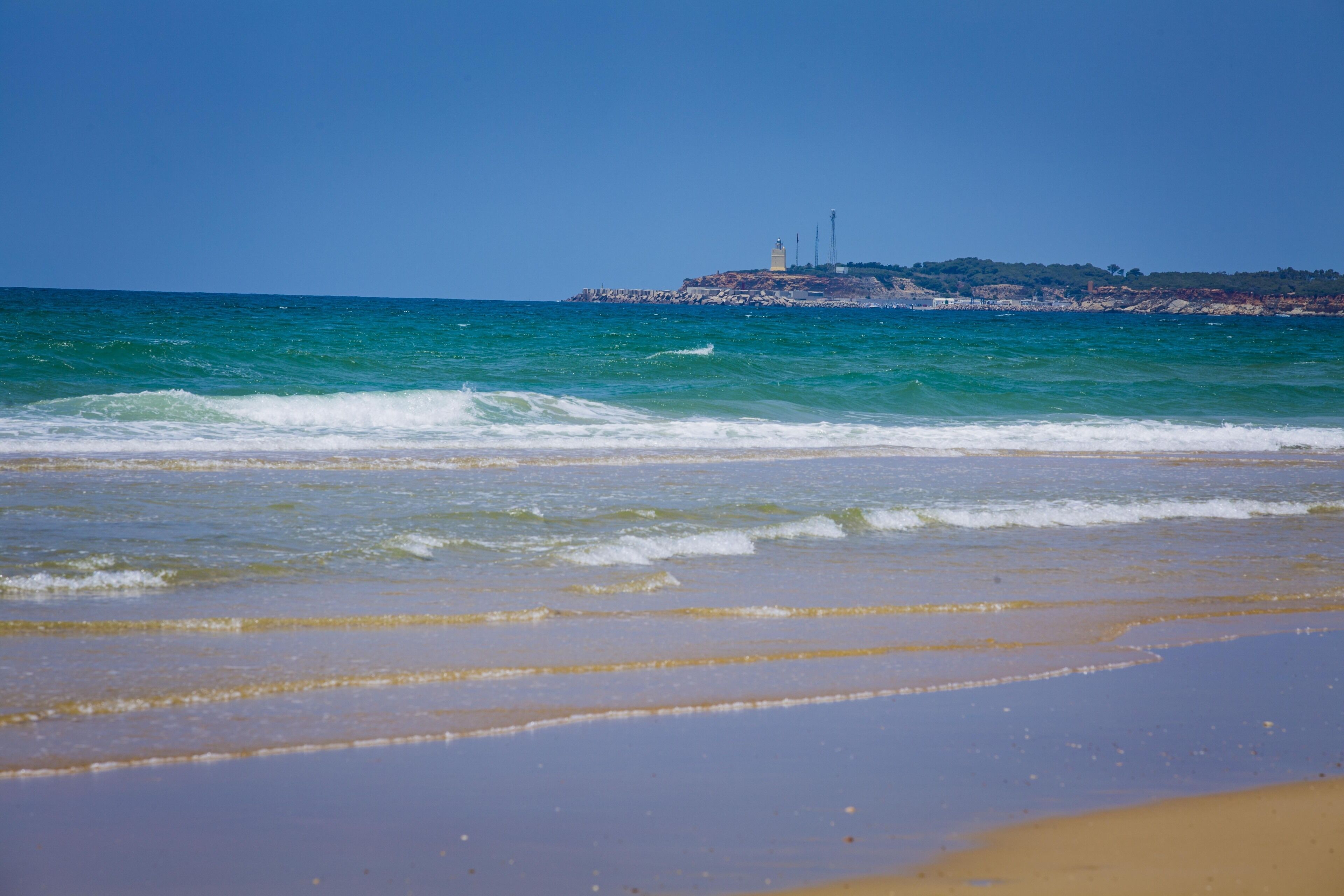 on the beach, white sand