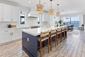 Fridge, microwave, oven, stovetop - Waterfront Luxury Home with Pool and Spa, Golf Cart, and beach Bikes included! (Bradenton Beach)