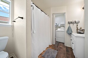 Combined shower/tub