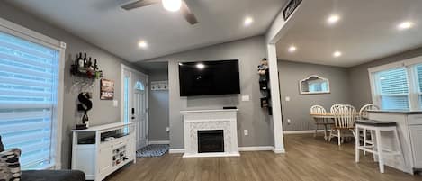 Smart TV, fireplace, smart speakers