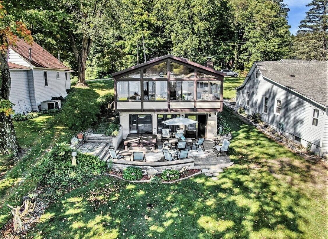 Updated and fully appointed Round Lake waterfront home w/ hot tub!
