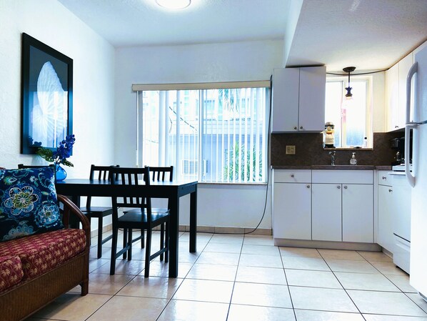 Fridge, stovetop, cookware/dishes/utensils