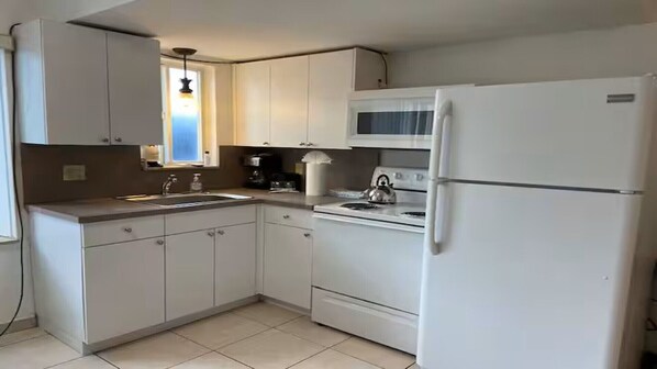 Fridge, stovetop, cookware/dishes/utensils