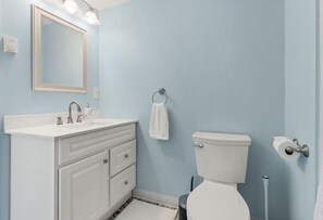 Bathtub, hair dryer, towels