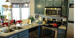 Fridge, oven, stovetop, dishwasher - Branson, MO -Spacious cottage in Resort; 3BD/2BA Heated Pools, Gym, and hot tub! (Branson)