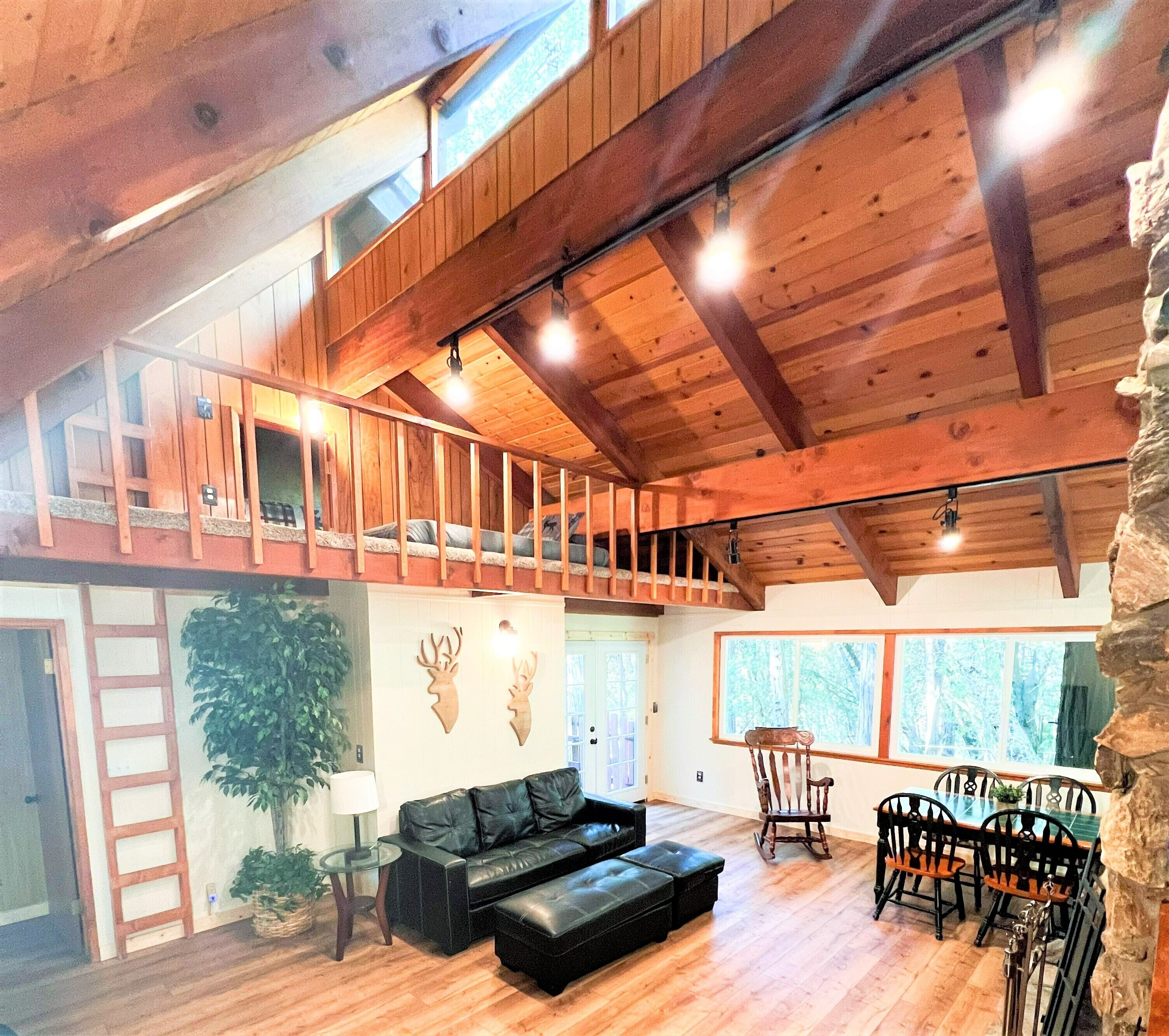 Trout River Cabin - Secluded Riverfront Adventure