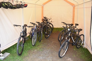A tent with bicycles parked inside.