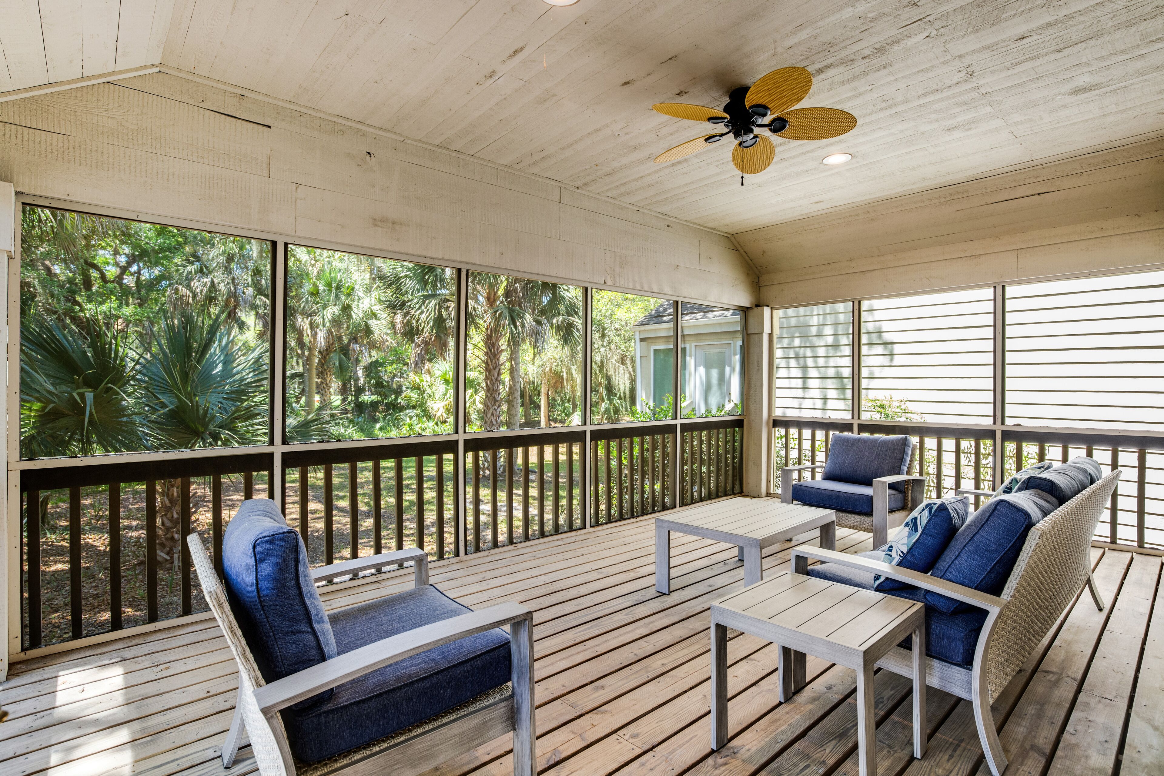Newly updated villa with porch, golf course views, on-site golf, tennis, & pools