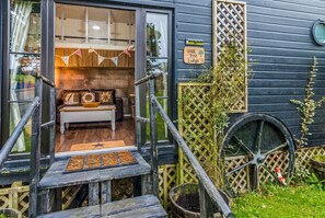 Terrace/patio - Two-Level Shepherd`s Hut · Sleeps 4 with Kids` Den · Fire Pit near Dartmouth (Dartmouth)