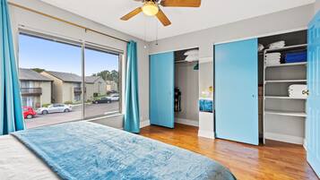 1 bedroom, desk, iron/ironing board, travel crib