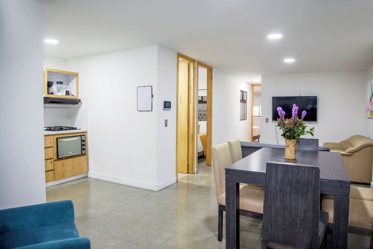 Family Apartment | Living room | 50-inch Smart TV with cable channels