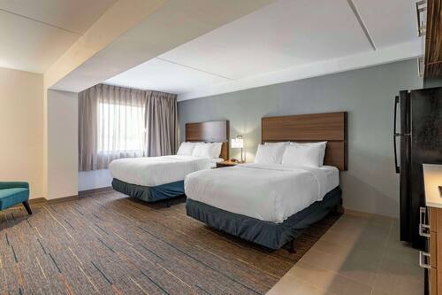 Suite, 2 Double Beds, Non Smoking | Pillowtop beds, desk, free WiFi, bed sheets
