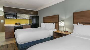 Colchones con pillow-top, escritorio, wifi gratis y ropa de cama