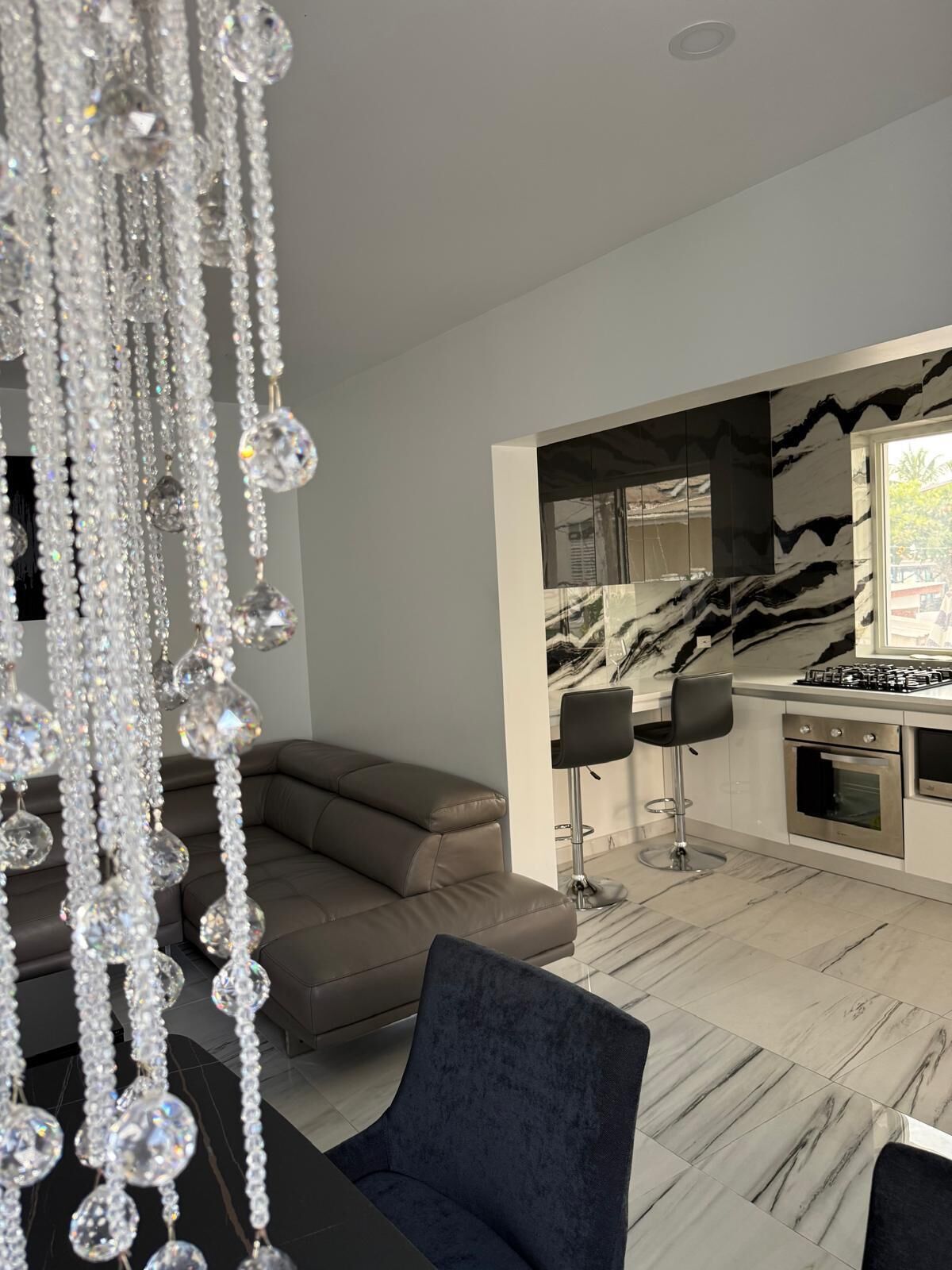 Exclusive Apartment | Living area | 55-inch Smart TV with cable channels