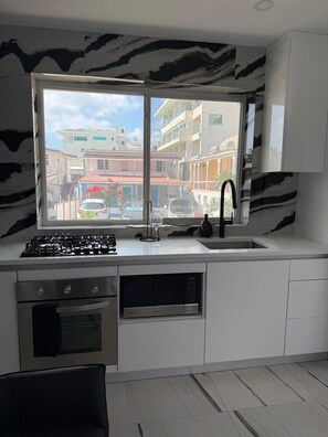 Apartamento exclusivo | Cozinha privada | Cafeteira/chaleira, chaleira elétrica, torradeira