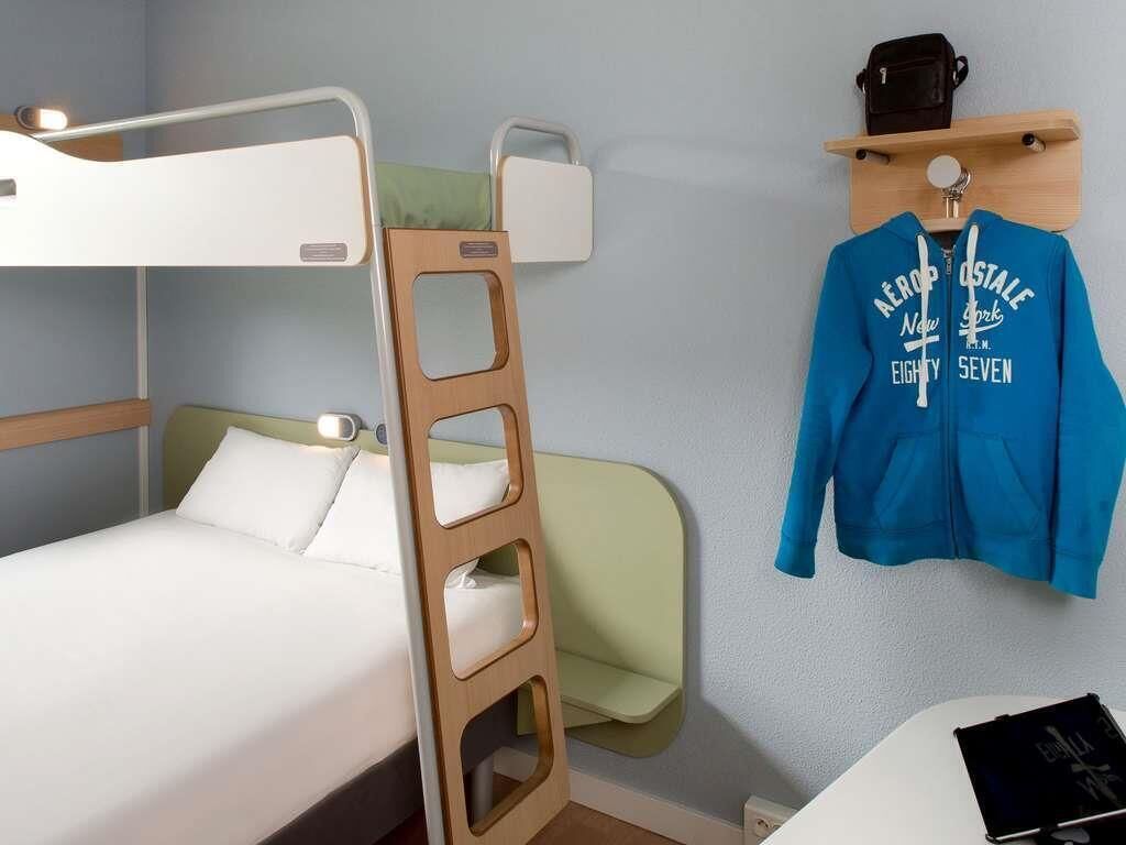 Triple Room, Multiple Beds | Desk, blackout drapes, soundproofing, free cribs/infant beds