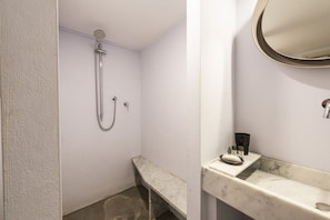 Shower, hair dryer, towels, shampoo