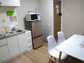 Fridge, microwave, cookware/dishes/utensils