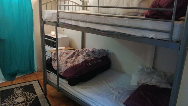 A bunk bed room with a desk and a small table. - one of the best place in Paris, it's historical, diplomatic zone. (Paris)