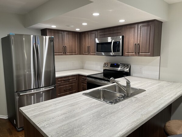 Fridge, microwave, oven, stovetop