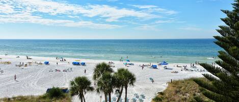 On the beach, sun-loungers, beach towels