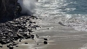 A rocky beach with waves crashing against the shore and a cliff in the background. - “Pacific Horizons” hot tub, ocean views, Gateway to Big Sur (Carmel-by-the-Sea)