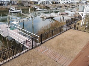 Property grounds - ABSOLUTIKI - 3 min walk to beach, Canal with Boat Dock, Outdoor Bar & Shower (Ocean Isle Beach)