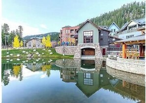 Situated on a hillside, this lodge offers a scenic view of the surrounding landscape.