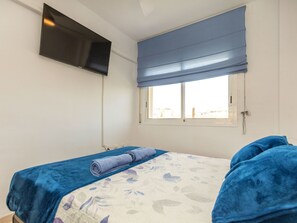 2 habitaciones y tabla de planchar con plancha 