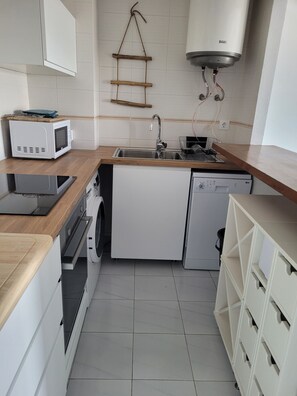Fridge, microwave, coffee/tea maker, toaster