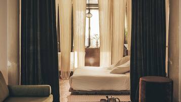 Floret | Premium bedding, down comforters, minibar, iron/ironing board