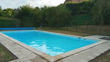 Alberca al aire libre y alberca climatizada