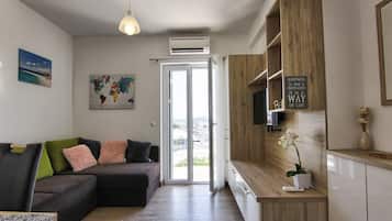 Apartment (One Bedroom Apartment with Terrace an) | Living room | TV