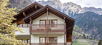 Appartement Taufner C 103 avec vue sur les montagnes, jardin et Wi-Fi.