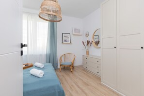 1 habitación, tabla de planchar con plancha, wifi y ropa de cama 