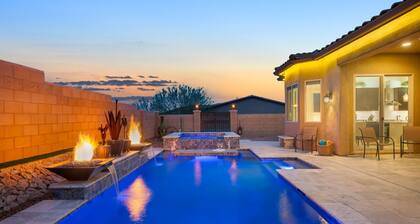 Gorgeous custom home with spa, heated pool, outdoor kitchen and game room!