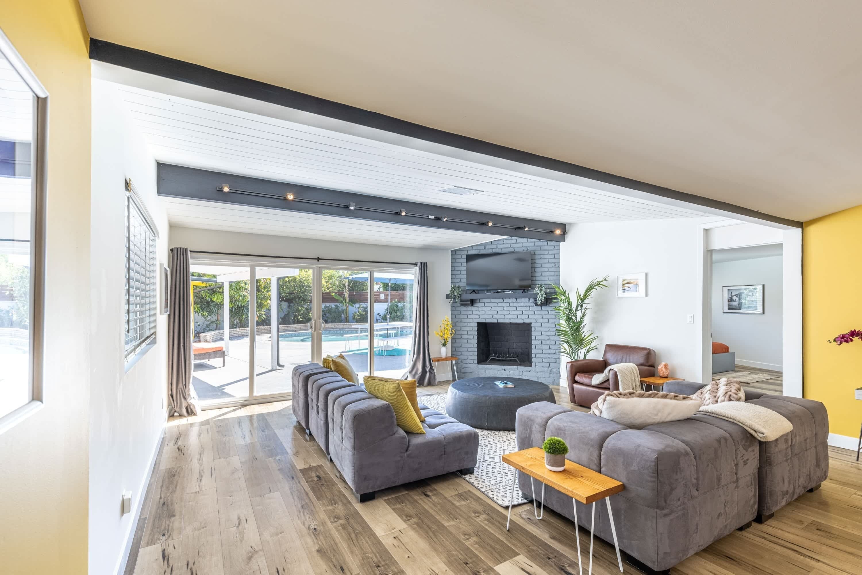 Spacious, open and bright living room with plenty of seating for big groups!