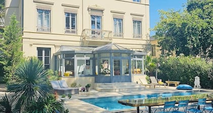 Charming and atypical castle located in town with a green park and swimming pool!