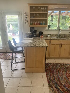 Fridge, microwave, oven, stovetop - Kennesaw Garden Pool House-Stay close to everything; Lake Point, Braves, and KSU (Kennesaw)
