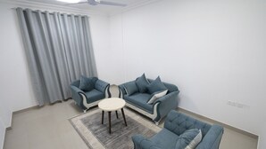 Habitación estándar con 1 cama doble o 2 individuales, 2 habitaciones, no fumadores | Zona de estar