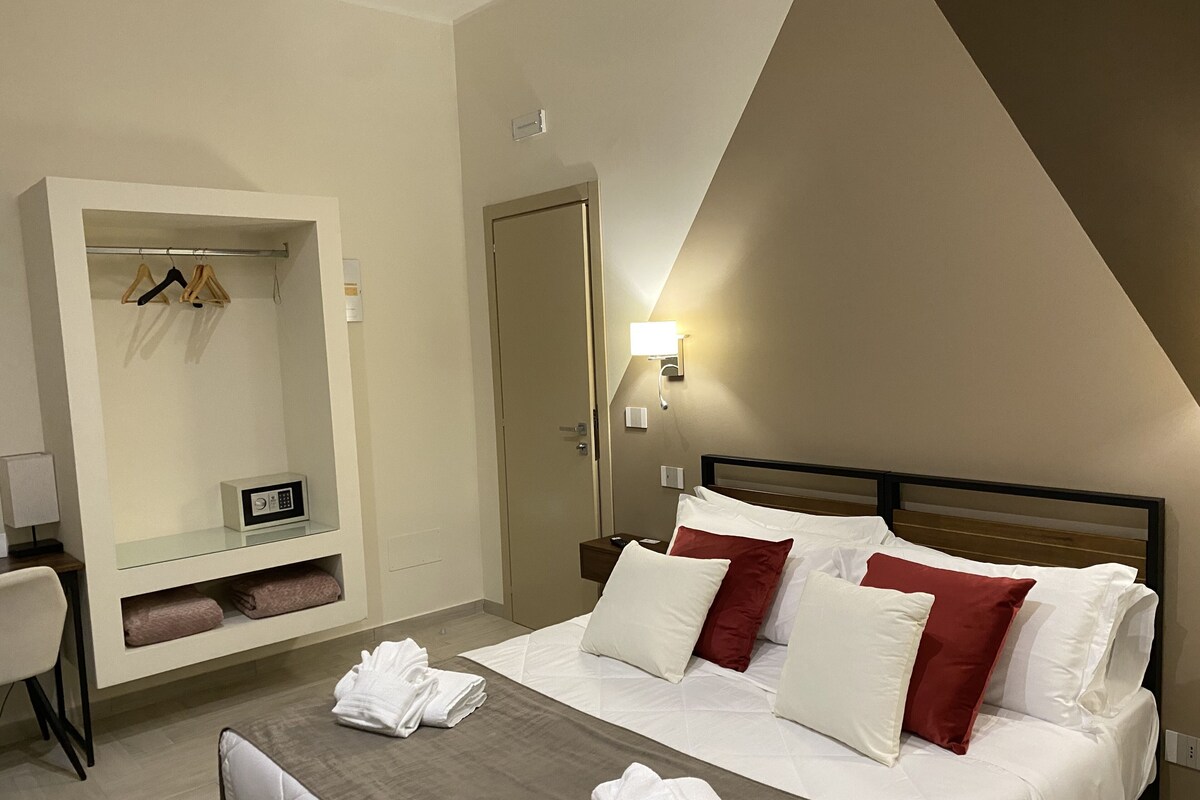 Memory-foam beds, minibar, desk, laptop workspace