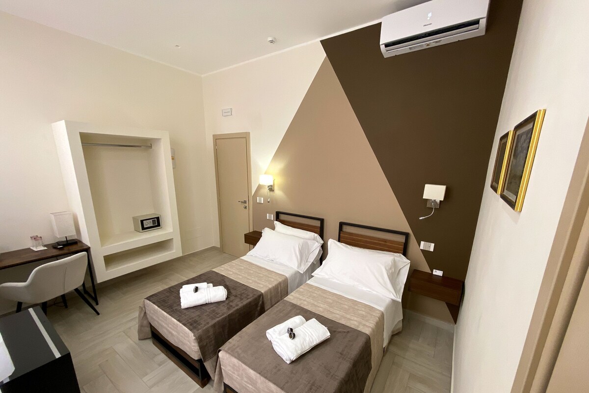 Memory foam beds, minibar, desk, laptop workspace